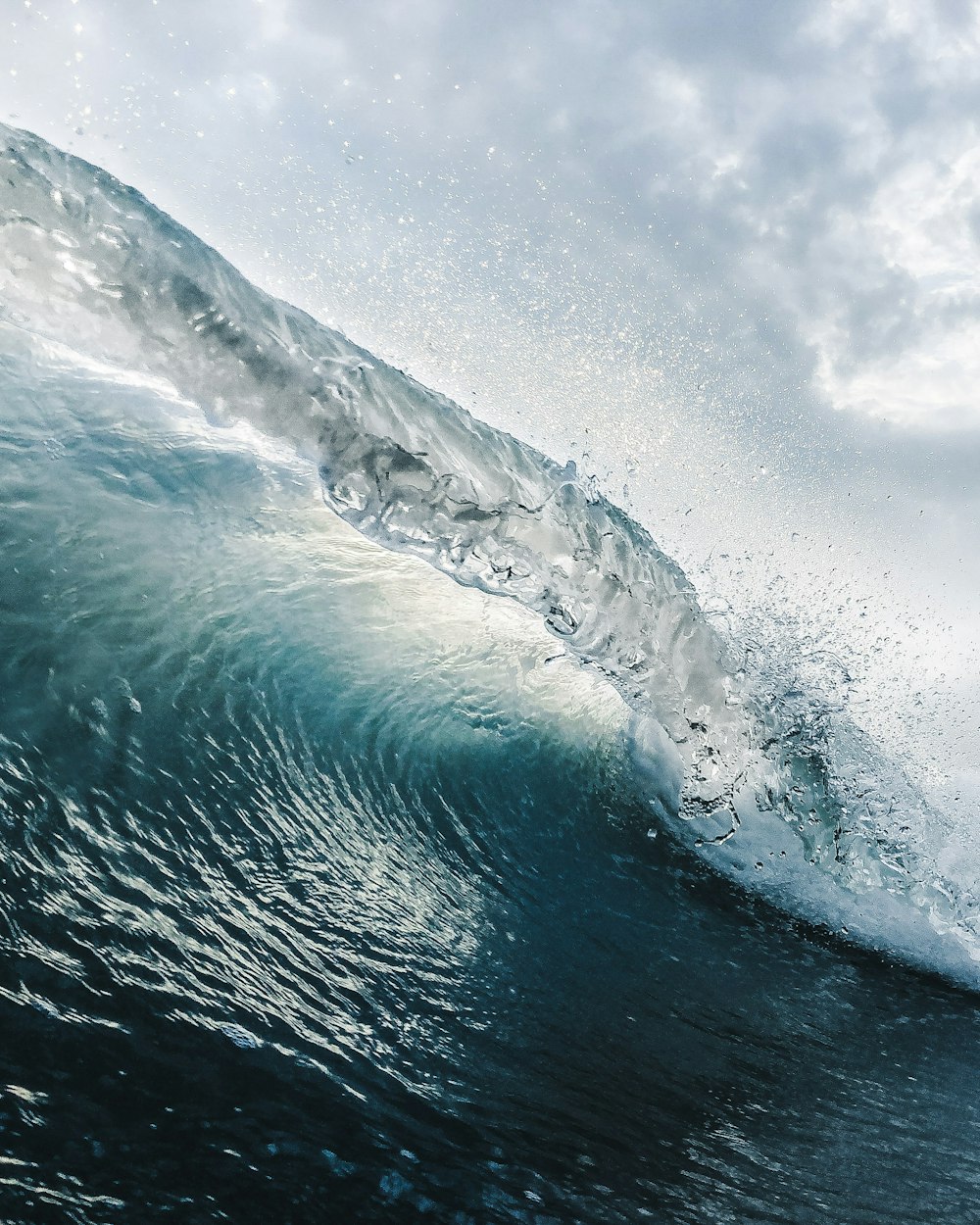 Clean wave peeling at sunrise